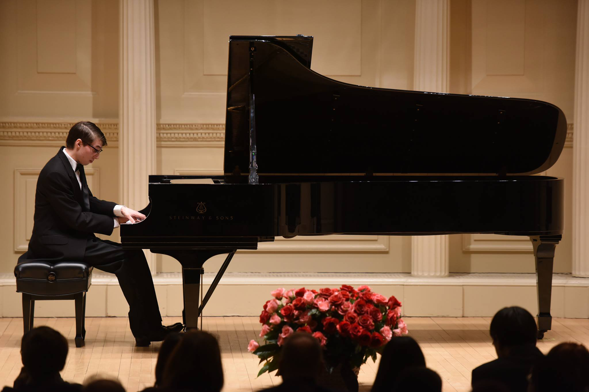 Photo of Jordan Mathews onstage performing at Carnegie Hall